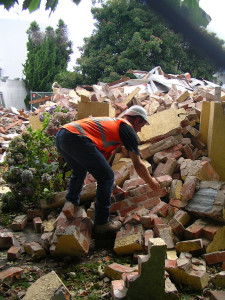Bricks being gathered from the rubble of no. 10 - 28 January